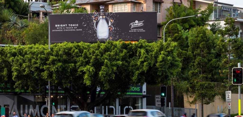 Schweppes advertising on roadside billboard