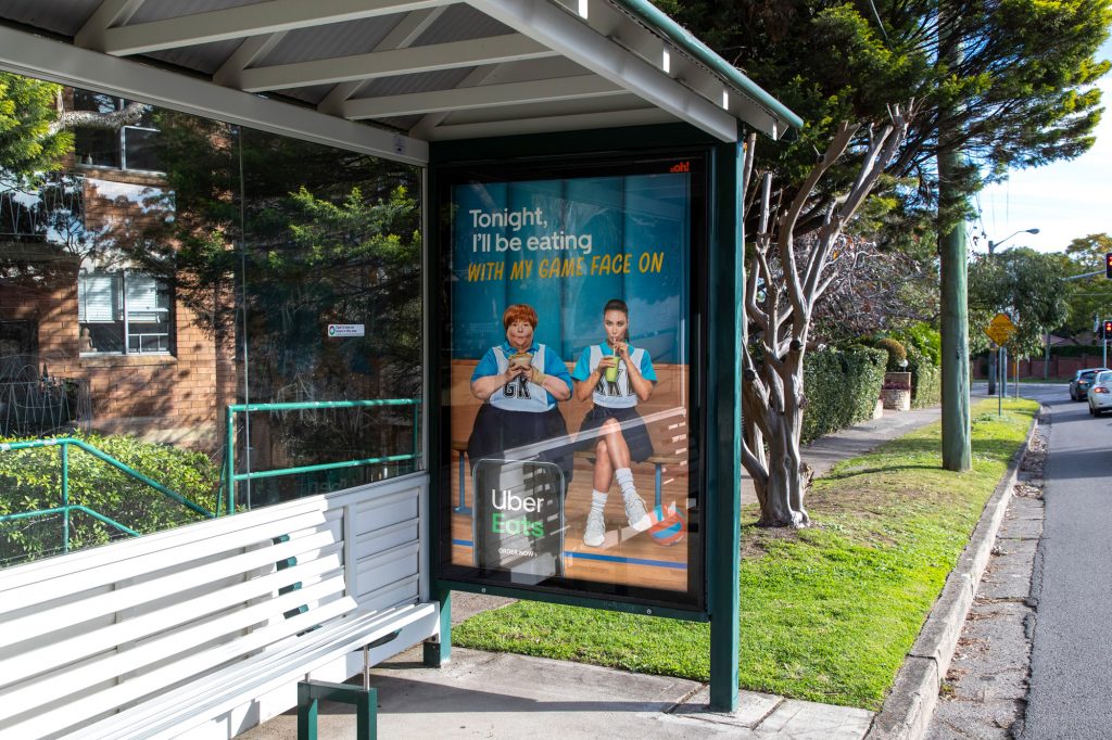 Uber Eats street furniture advertising on bus shelter