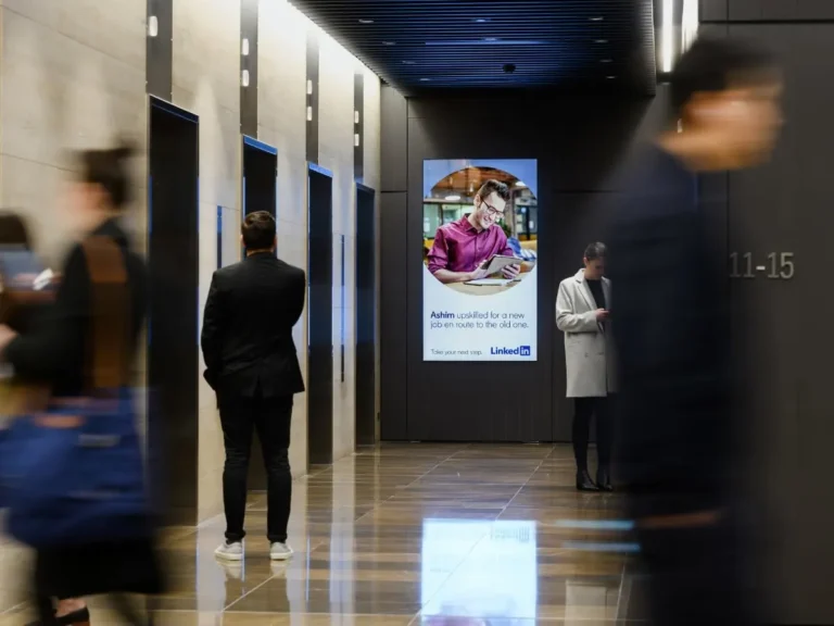 Digital advertising OOH panel in office lobby Sydney