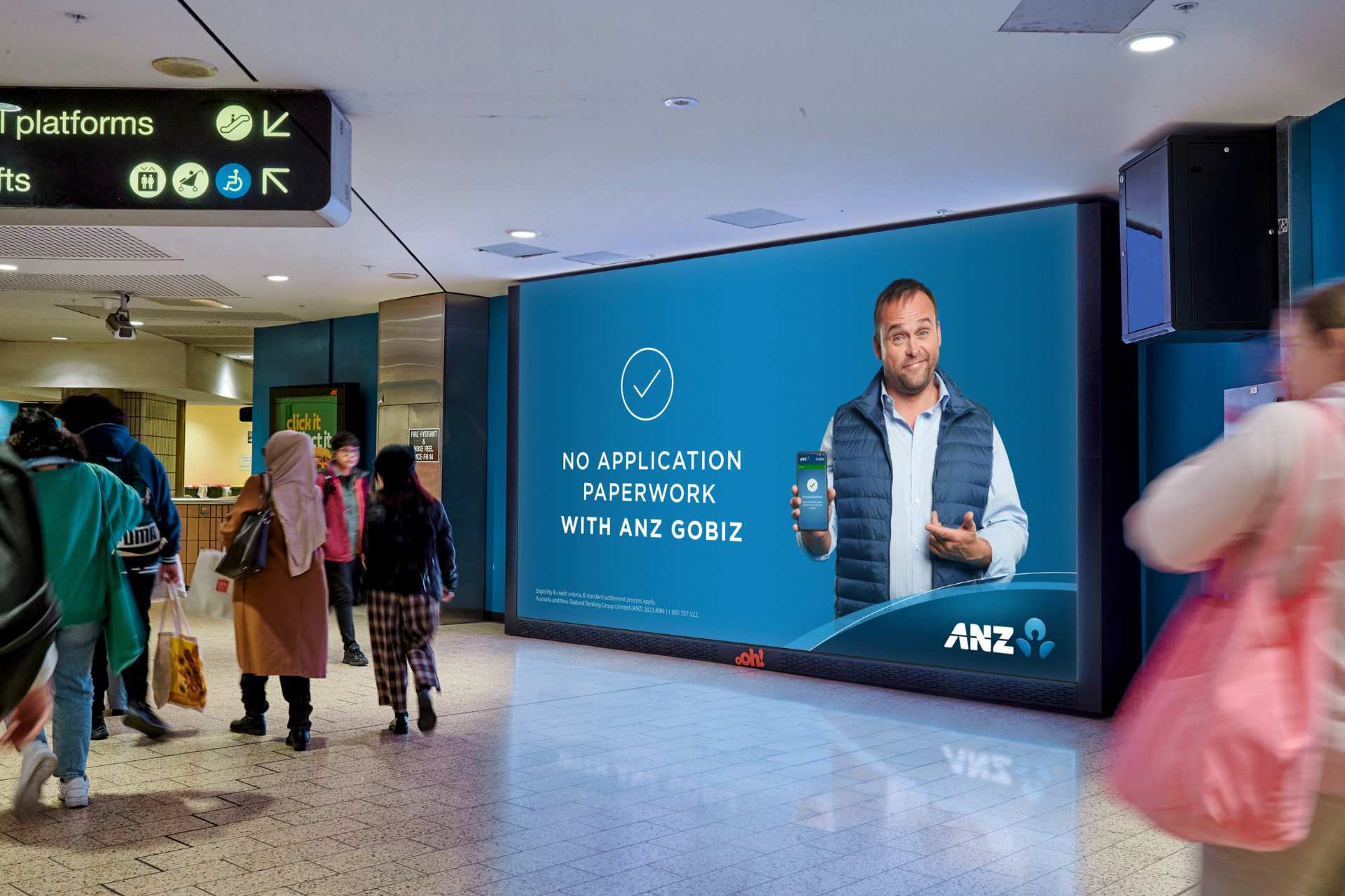 Melbourne train station rail digital billboard featuring ANZ creative