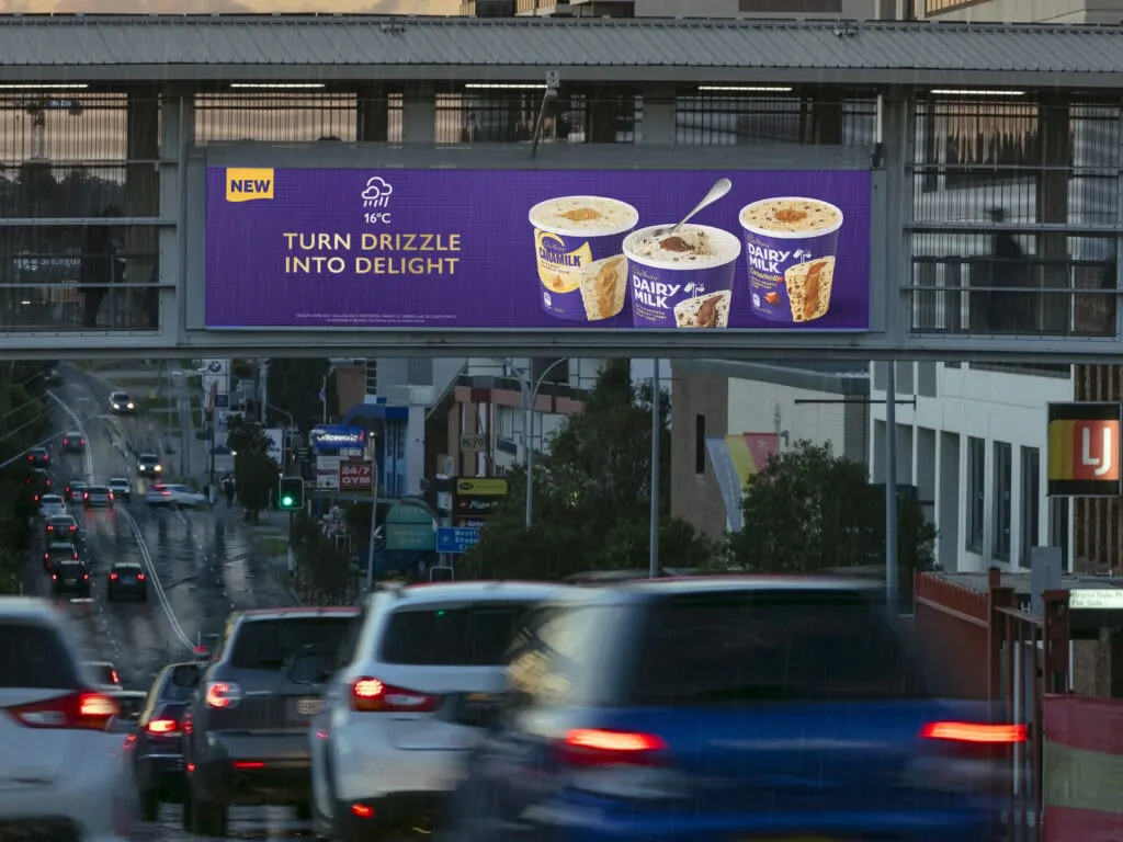 Digital billboard featuring dynamic creative for Cadbury