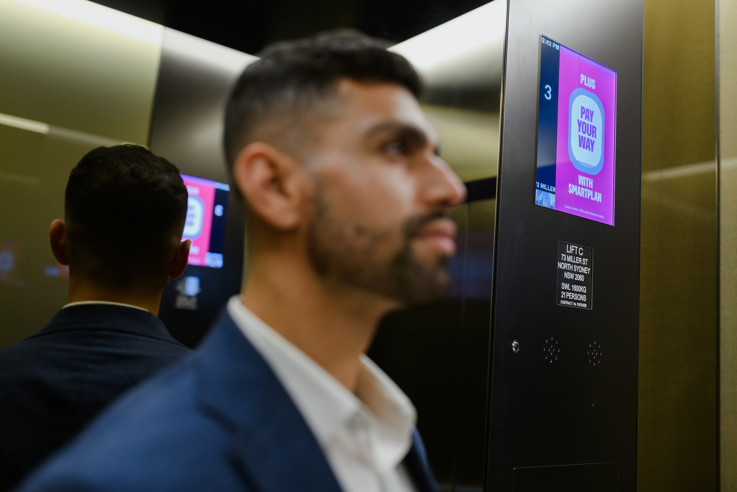 Digital advertising in office lift, Sydney