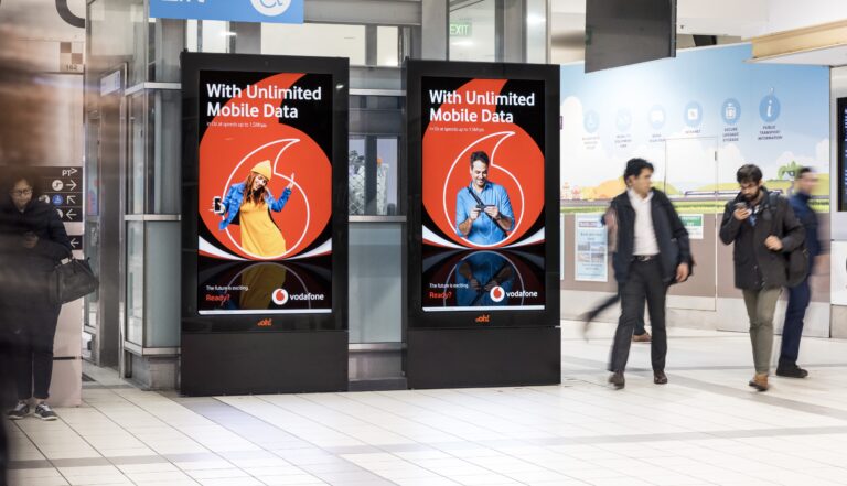 Melbourne train station digital advertising screen OOH featuring Vodafone creative