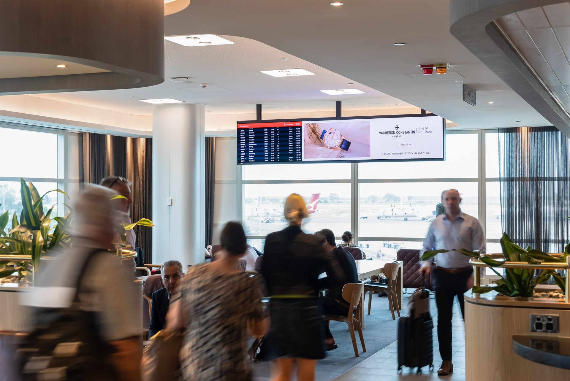 Airport Qantas lounge digital billboard premium