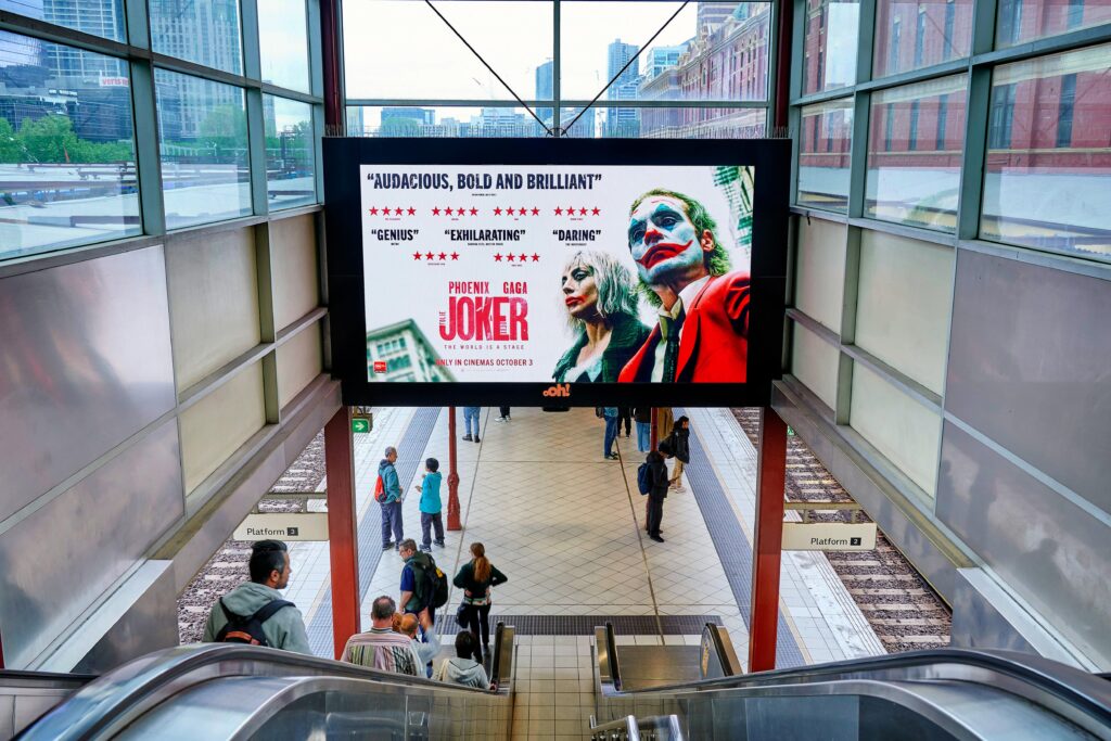 Digital train station advertising in Melbourne, The Joker