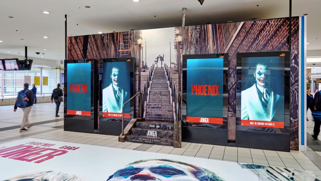 Digital train station advertising takeover in Melbourne, The Joker