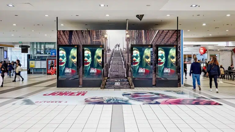 Digital train station advertising takeover in Melbourne, The Joker