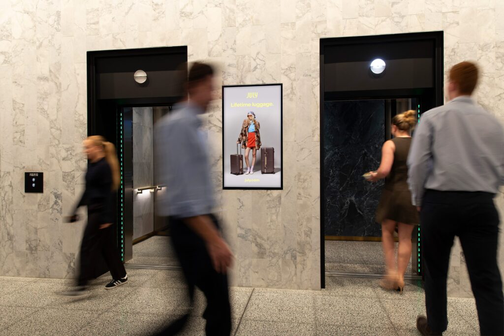 Digital advertising screen in office lobby, Queensland