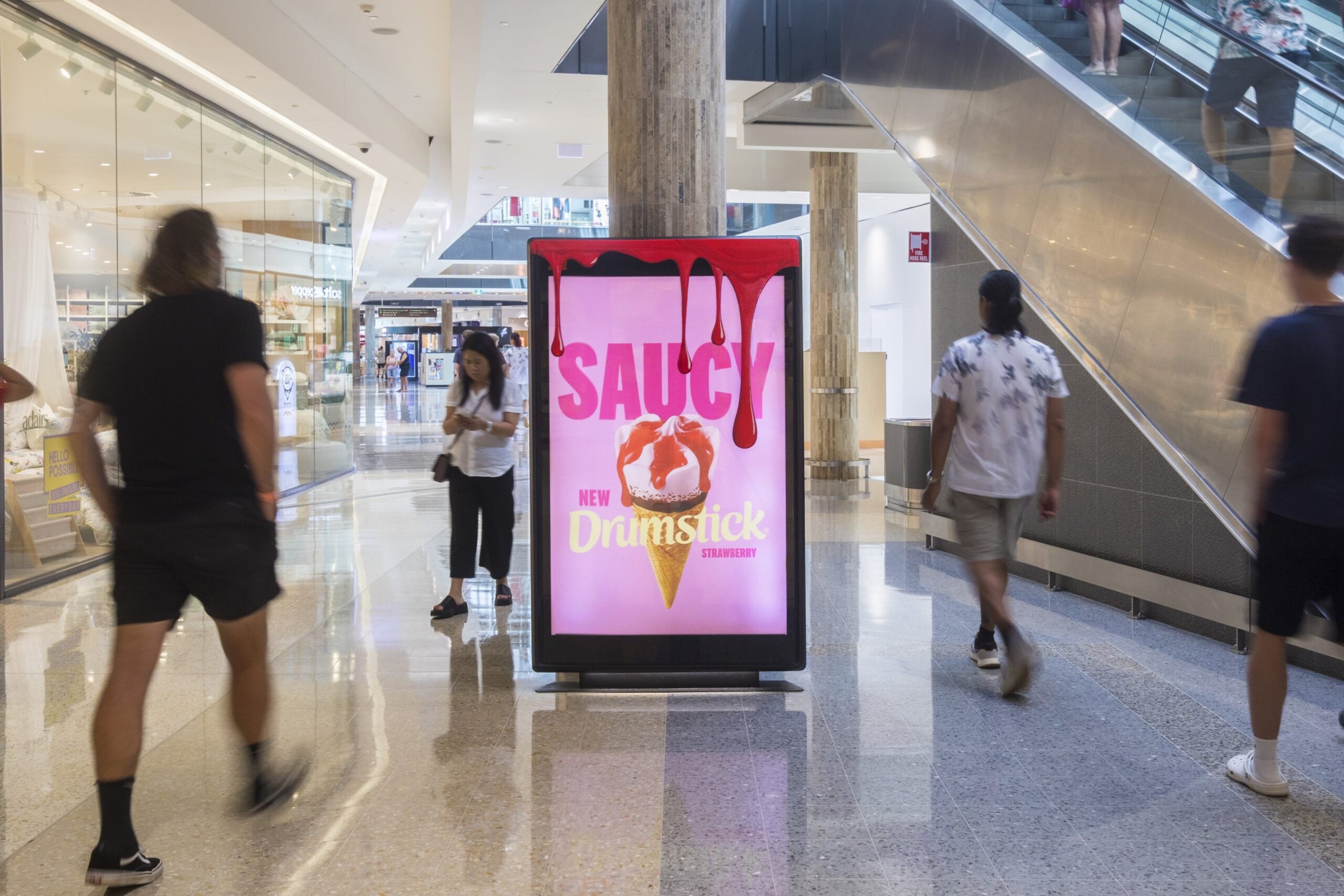 Digital retail advertising panel in Queensland, Drumstick Saucy campaign