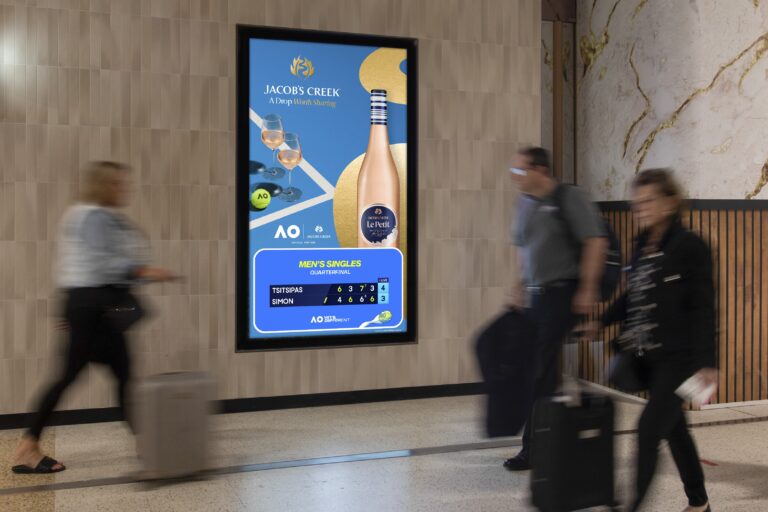 Digital advertising screen in airport, Australian Open creative featuring Jacob's Creek