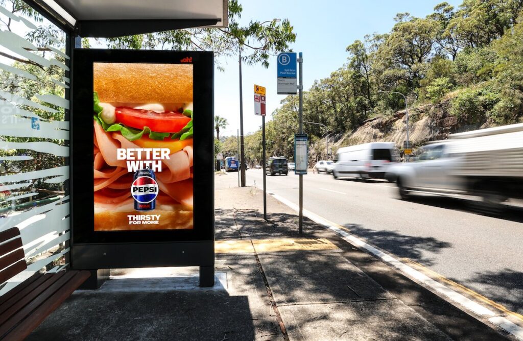 Digital bus shelter advertising panel in Sydney, featuring Pepsi Max creative