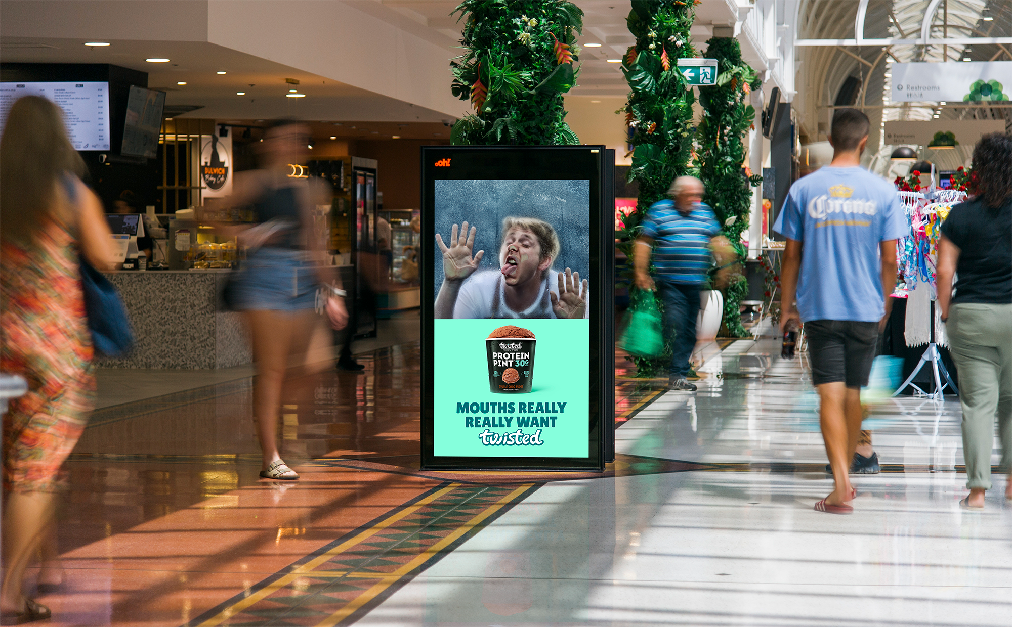 Digital advertising screen in The Grove retail centre in Adelaide, featuring Twisted Treats creative